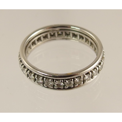 734 - A French 18ct white gold full eternity ring