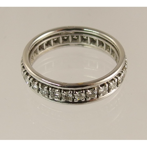 734 - A French 18ct white gold full eternity ring