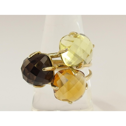 742 - A 14ct gold citrine and quartz dress ring