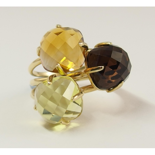 742 - A 14ct gold citrine and quartz dress ring