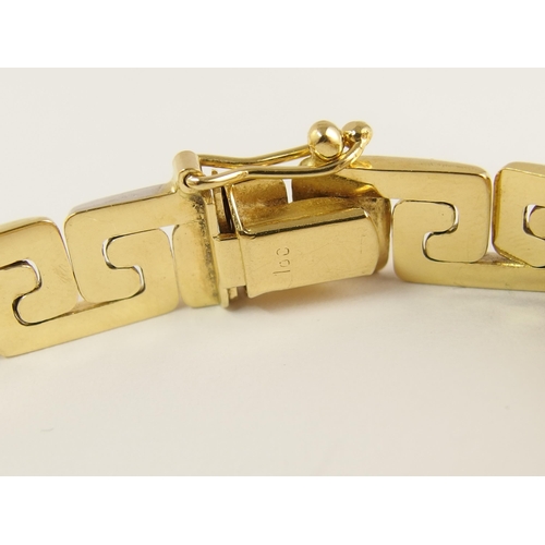 745 - An 18ct gold Greek key design bracelet