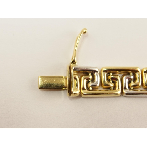 745 - An 18ct gold Greek key design bracelet