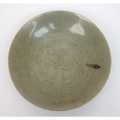 75 - A Chinese celadon saucer dish