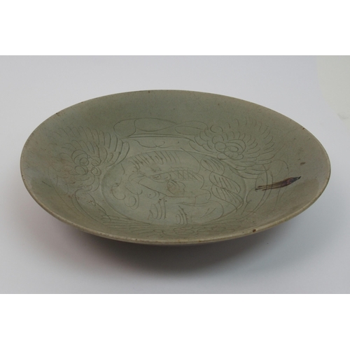 75 - A Chinese celadon saucer dish