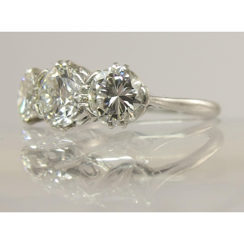 750 - A substantial three stone diamond ring