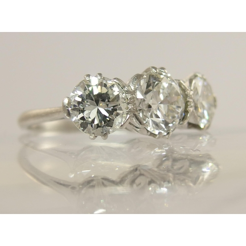 750 - A substantial three stone diamond ring