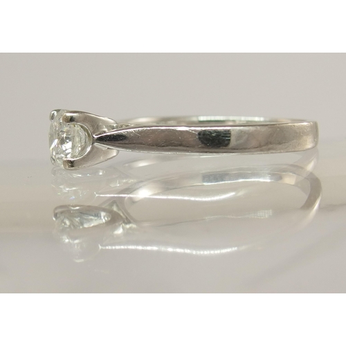 752 - An 18ct white gold solitaire diamond ring