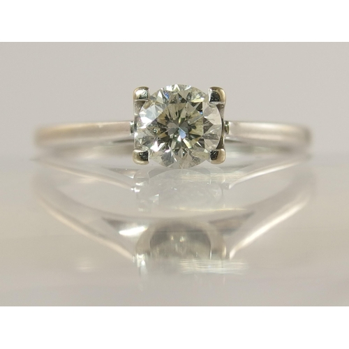 754 - An 18ct white gold solitaire diamond ring