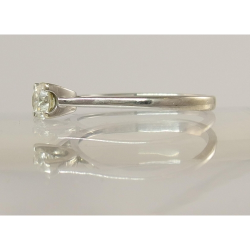 754 - An 18ct white gold solitaire diamond ring