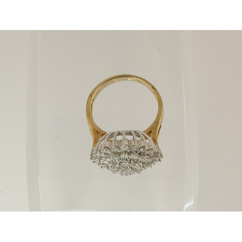 755 - A 9ct gold diamond cluster ring