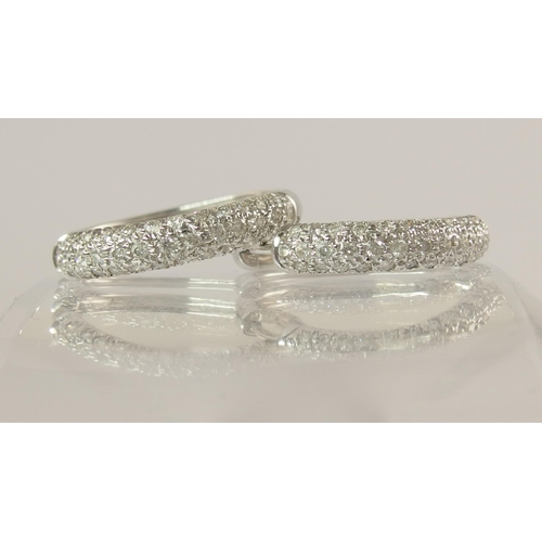 759 - A pair of 9ct white gold diamond pave set earrings