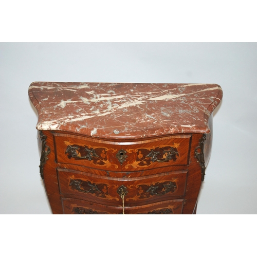 803 - A Louis XV style rosewood serpentine shaped commode