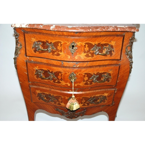 803 - A Louis XV style rosewood serpentine shaped commode