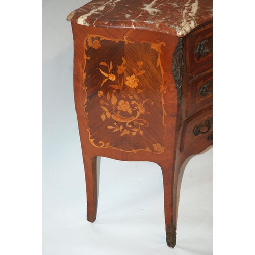 803 - A Louis XV style rosewood serpentine shaped commode