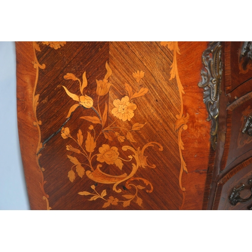 803 - A Louis XV style rosewood serpentine shaped commode