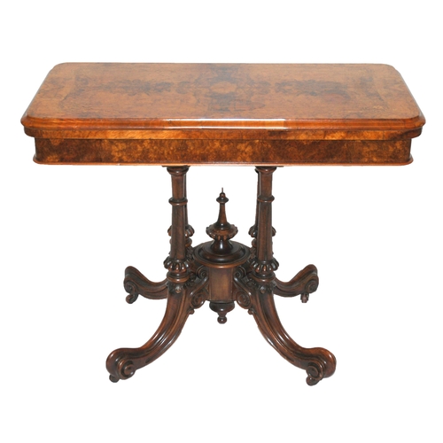 806 - A Victorian walnut card table