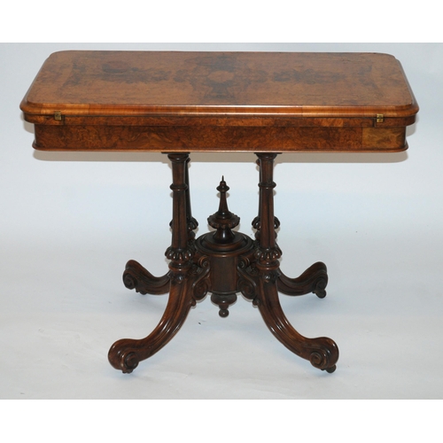 806 - A Victorian walnut card table