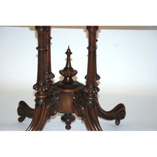 806 - A Victorian walnut card table