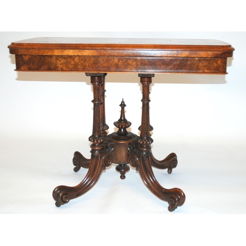 806 - A Victorian walnut card table