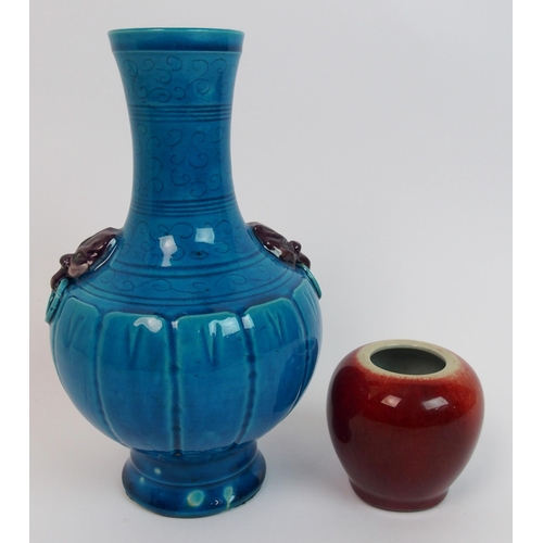 104 - A Chinese archaic style blue ground vase