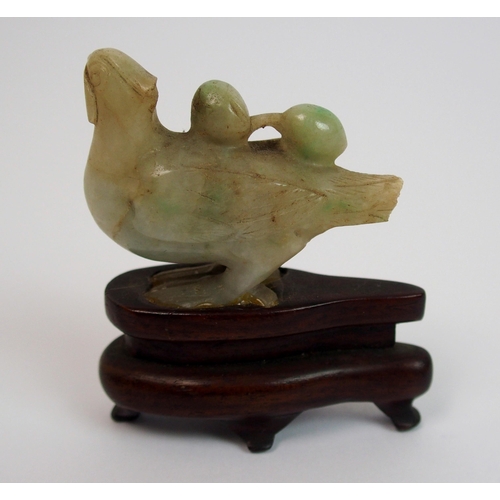 105 - A Chinese jade carving of a feline and cub