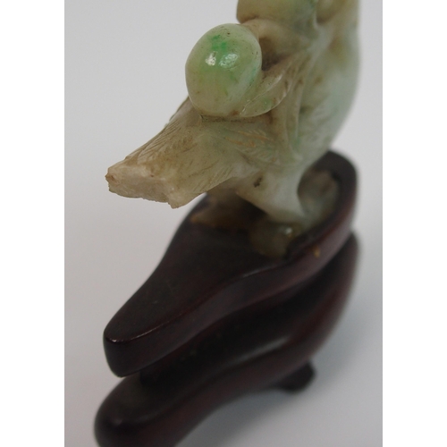 105 - A Chinese jade carving of a feline and cub