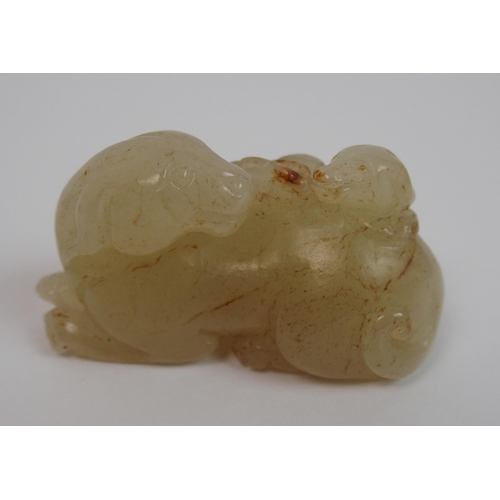 105 - A Chinese jade carving of a feline and cub