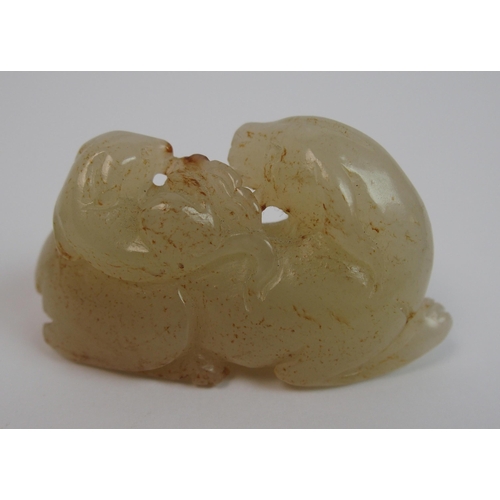 105 - A Chinese jade carving of a feline and cub