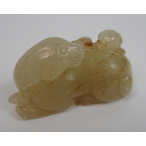 105 - A Chinese jade carving of a feline and cub