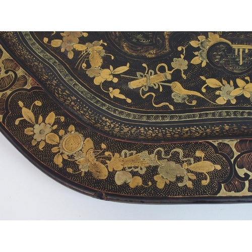 111 - A Chinese export black and gold lacquered tea tray