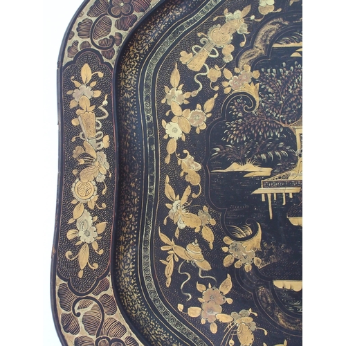 111 - A Chinese export black and gold lacquered tea tray