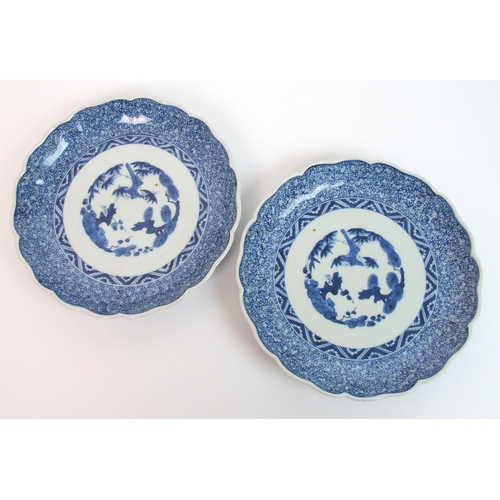 112 - A pair of Arita blue and white lobed dishes