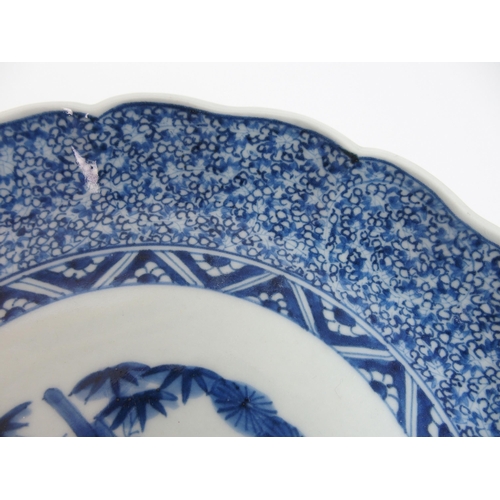 112 - A pair of Arita blue and white lobed dishes