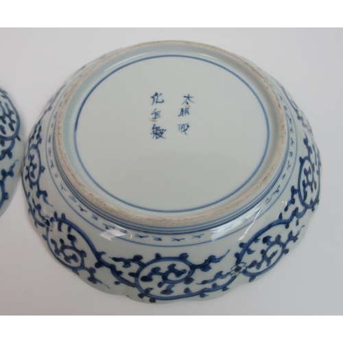 112 - A pair of Arita blue and white lobed dishes