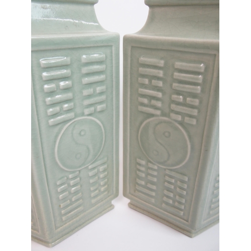 115 - A pair of Chinese celadon archaic style Cong vases