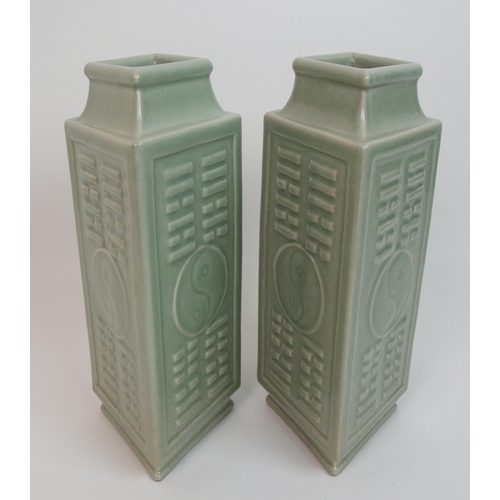 115 - A pair of Chinese celadon archaic style Cong vases