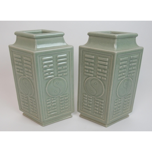 115 - A pair of Chinese celadon archaic style Cong vases