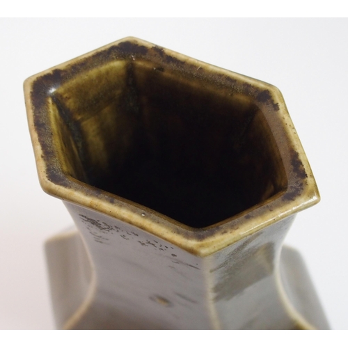 116 - A Chinese teadust glazed hexagonal baluster vase