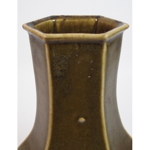 116 - A Chinese teadust glazed hexagonal baluster vase