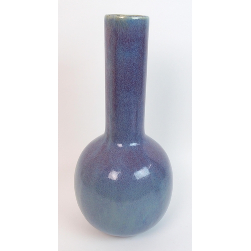 125 - A Chinese purple and green glazed baluster vase