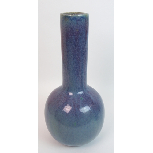 125 - A Chinese purple and green glazed baluster vase