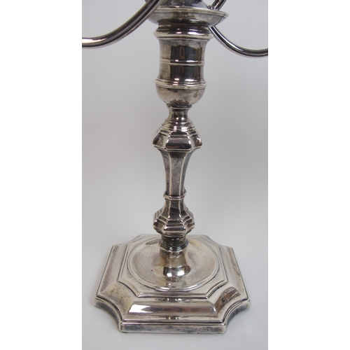 167 - A pair of early 20th Century silver candelabra