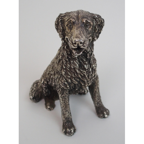 177 - A cast silver figure of a retriever dog