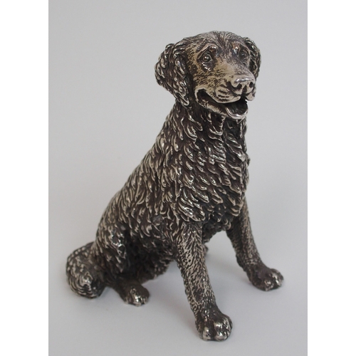 177 - A cast silver figure of a retriever dog