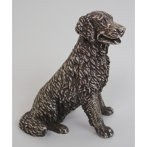 177 - A cast silver figure of a retriever dog