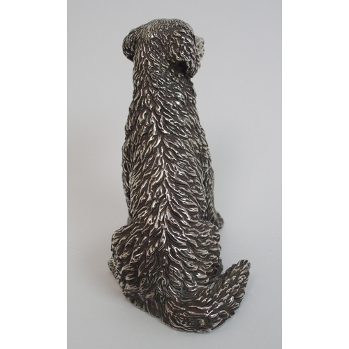 177 - A cast silver figure of a retriever dog