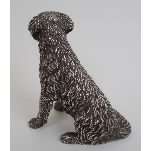 177 - A cast silver figure of a retriever dog