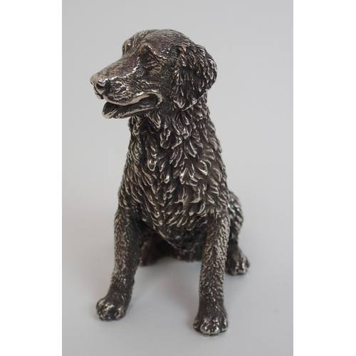 177 - A cast silver figure of a retriever dog