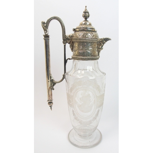 186 - A silver plate mounted claret jug