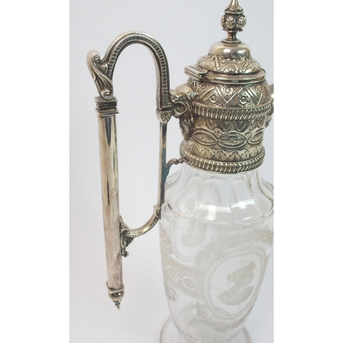 186 - A silver plate mounted claret jug